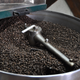 Beans dry in the roaster at the state-run El Escorial in Old Havana.